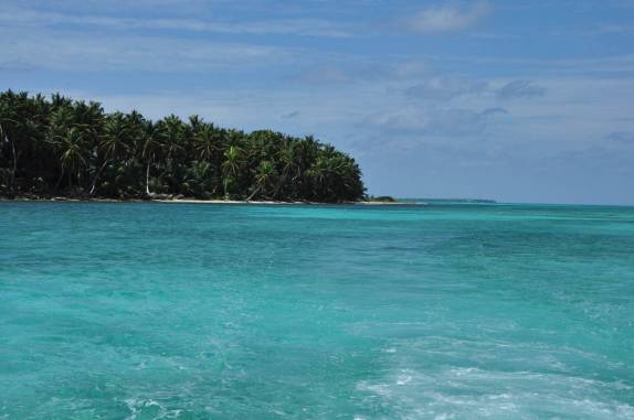 Chegando à Half Moon Caye, perto do Blue Hole, na grande barreira de corais, em Belize